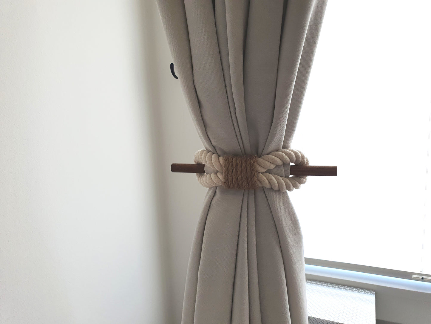 White and beige decorative rope holdback